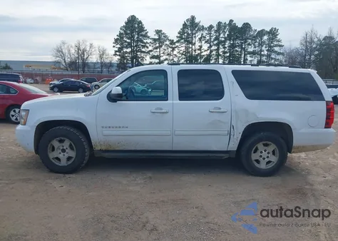 2013 Chevrolet Suburban 1500 Lt z USA, uszkodzony, nr VIN 1GNSCJE09DR179419